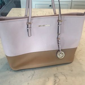 Michael Kors pink and tan zip traveler’s tote